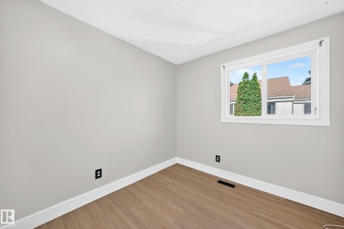 54 Woodvale Village Nw, Edmonton, AB - Indoor Photo Showing Other Room