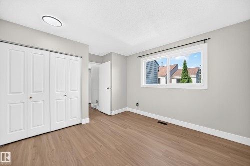 54 Woodvale Village Nw, Edmonton, AB - Indoor Photo Showing Other Room