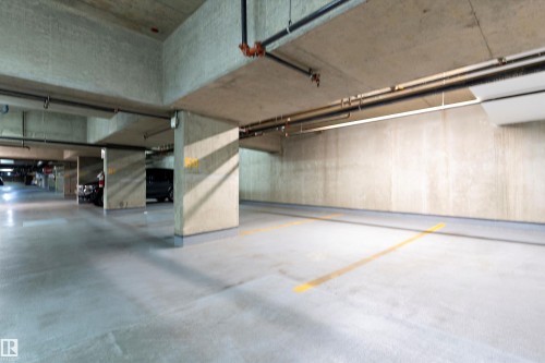 #702 10303 111 St Nw, Edmonton, AB - Indoor Photo Showing Garage