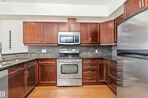 #702 10303 111 St Nw, Edmonton, AB - Indoor Photo Showing Kitchen With Double Sink