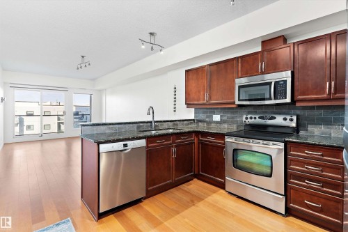 #702 10303 111 St Nw, Edmonton, AB - Indoor Photo Showing Kitchen With Stainless Steel Kitchen