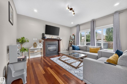 3006 Montrose Boulevard, Beaumont, AB - Indoor Photo Showing Living Room With Fireplace