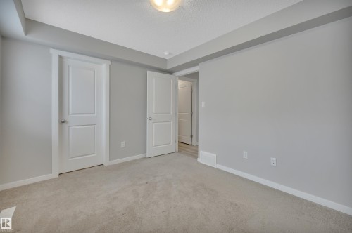 #19 1110 Daniels Link Li Sw, Edmonton, AB - Indoor Photo Showing Other Room