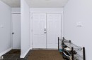 Dual panel entry door with panel detailing - 6016 177 Street Nw, Edmonton, AB  - Indoor Photo Showing Other Room 
