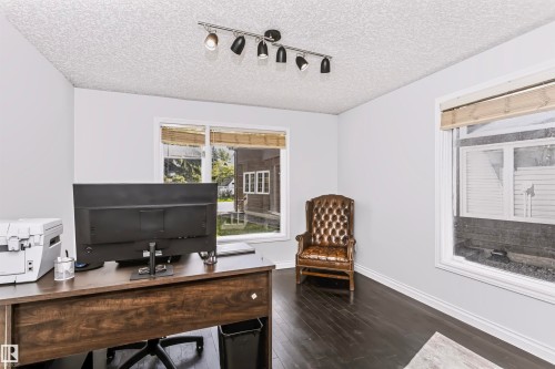 Recessed lighting, wood-finish flooring, and white trim - 6016 177 Street Nw, Edmonton, AB - Indoor