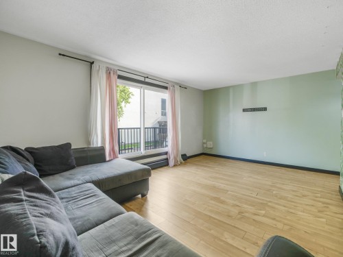 #205 10606 123 St Nw, Edmonton, AB - Indoor Photo Showing Living Room