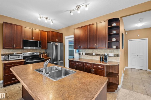 407 Brintnell Boulevard Nw, Edmonton, AB - Indoor Photo Showing Kitchen With Double Sink