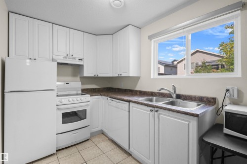 407 Brintnell Boulevard Nw, Edmonton, AB - Indoor Photo Showing Kitchen With Double Sink