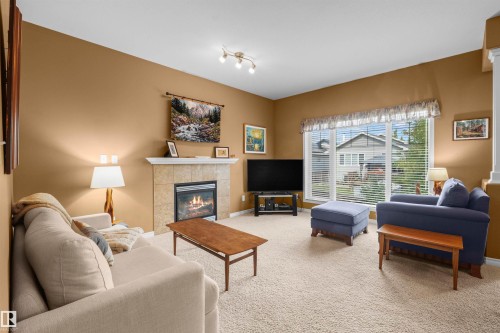 407 Brintnell Boulevard Nw, Edmonton, AB - Indoor Photo Showing Living Room With Fireplace