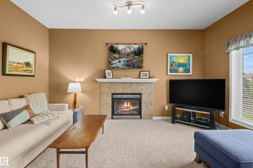 407 Brintnell Boulevard Nw, Edmonton, AB - Indoor Photo Showing Living Room With Fireplace