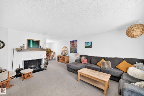 3516 117A Street Nw, Edmonton, AB - Indoor Photo Showing Living Room With Fireplace