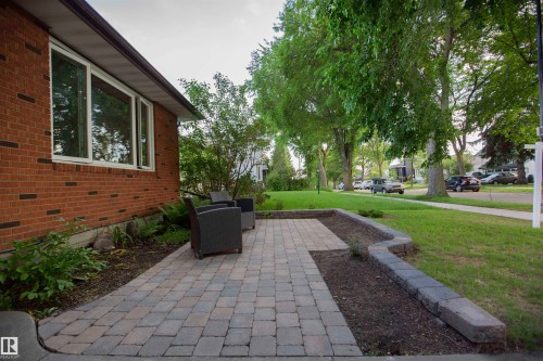 Front patio with paver stone surface - 11131 52 Street Nw, Edmonton, AB - Outdoor