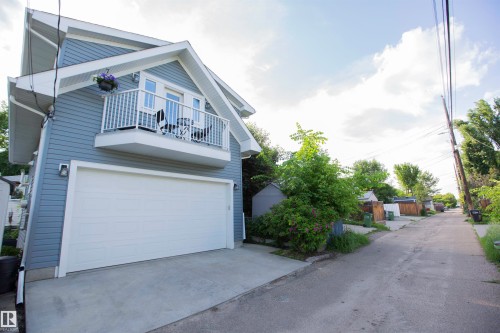 Contemporary detached structure featuring horizontal siding and a prominent dormer - 11131 52 Street Nw, Edmonton, AB - Outdoor With Exterior