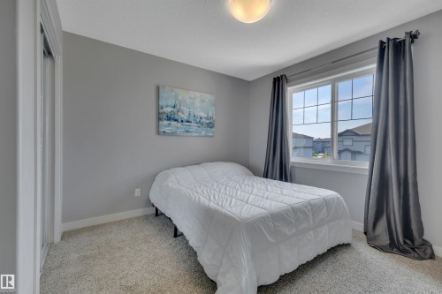 3812 Triomphe Boulevard, Beaumont, AB - Indoor Photo Showing Bedroom