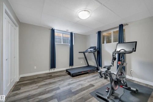 3812 Triomphe Boulevard, Beaumont, AB - Indoor Photo Showing Gym Room