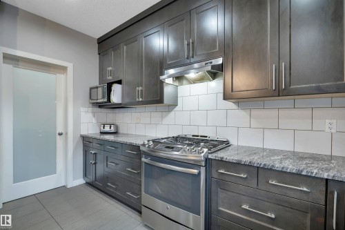 3812 Triomphe Boulevard, Beaumont, AB - Indoor Photo Showing Kitchen With Upgraded Kitchen
