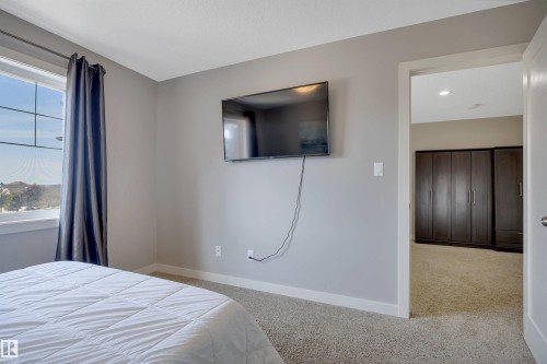 3812 Triomphe Boulevard, Beaumont, AB - Indoor Photo Showing Bedroom