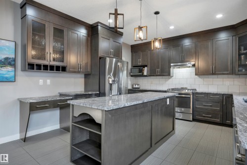 3812 Triomphe Boulevard, Beaumont, AB - Indoor Photo Showing Kitchen With Upgraded Kitchen