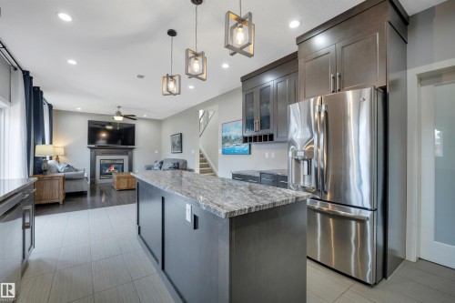3812 Triomphe Boulevard, Beaumont, AB - Indoor Photo Showing Kitchen With Upgraded Kitchen