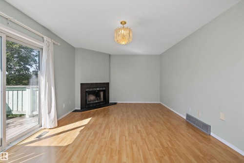 #29 9520 174 St Nw, Edmonton, AB - Indoor Photo Showing Living Room With Fireplace