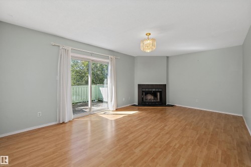 #29 9520 174 St Nw, Edmonton, AB - Indoor Photo Showing Living Room With Fireplace