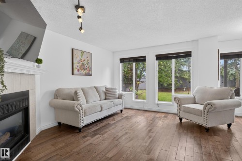 12724 148 Avenue Nw, Edmonton, AB - Indoor Photo Showing Living Room With Fireplace