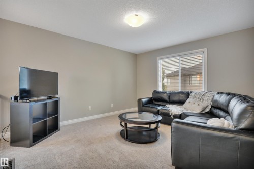 208 Bridgeport Close, Leduc, AB - Indoor Photo Showing Living Room