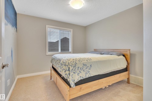 208 Bridgeport Close, Leduc, AB - Indoor Photo Showing Bedroom