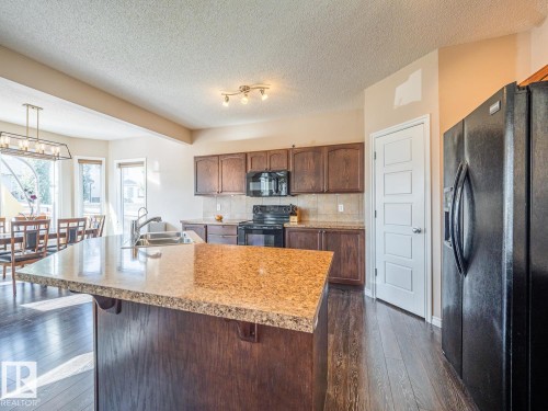 3233 21A Avenue Nw, Edmonton, AB - Indoor Photo Showing Kitchen With Double Sink