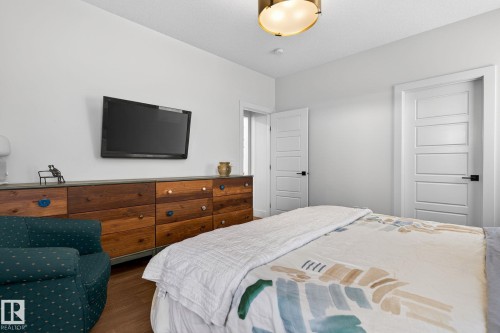 Recessed lighting, wood-finish flooring, and white walls - 45 Evermore Crescent, St. Albert, AB - Indoor Photo Showing Bedroom