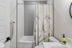 White subway tile with contrasting gray accent tile - 