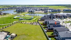 Solar panel system installed on a dark gray roof - 