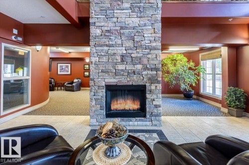#342 45 Inglewood Dr, St. Albert, AB - Indoor Photo Showing Living Room With Fireplace