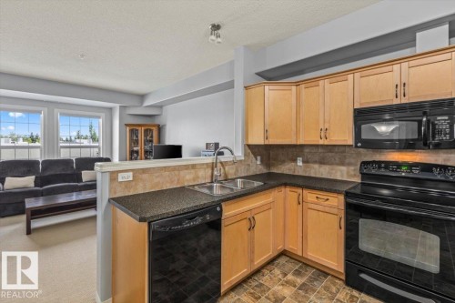 #342 45 Inglewood Dr, St. Albert, AB - Indoor Photo Showing Kitchen With Double Sink