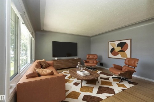 Expansive windows with white trim, light wood-finish flooring, and a neutral wall color - 12322 94 Street Nw, Edmonton, AB - Indoor