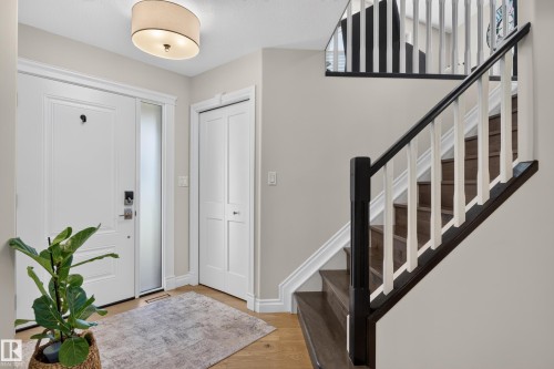 Wood-finish flooring throughout. - 30 Hillcrest Place, St. Albert, AB - Indoor Photo Showing Other Room