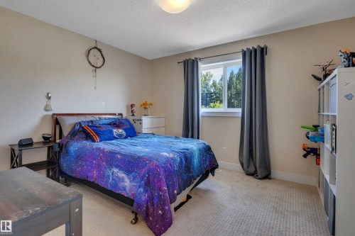 3910 49 Avenue, Beaumont, AB - Indoor Photo Showing Bedroom