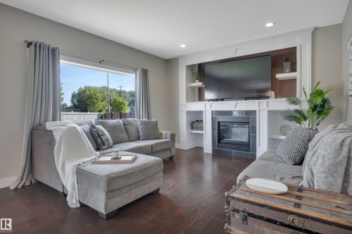3910 49 Avenue, Beaumont, AB - Indoor Photo Showing Living Room With Fireplace