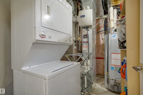 3910 49 Avenue, Beaumont, AB - Indoor Photo Showing Laundry Room