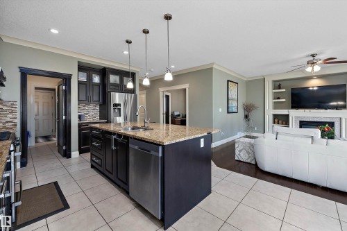 13504 163 Avenue Nw, Edmonton, AB - Indoor Photo Showing Kitchen With Fireplace With Double Sink With Upgraded Kitchen
