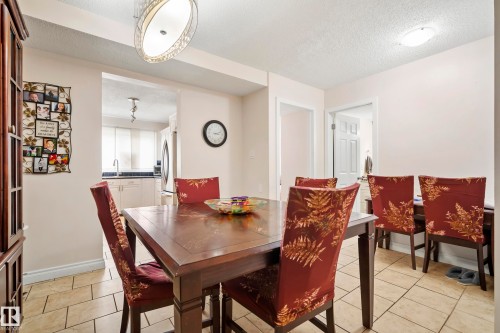 Recessed lighting, tile flooring. - #25 3811 85 St Nw, Edmonton, AB - Indoor Photo Showing Dining Room