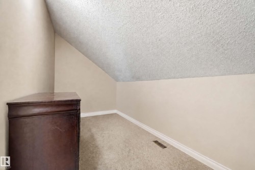 Extra space for desk or TV just off the third bedroom. - #25 3811 85 St Nw, Edmonton, AB - Indoor Photo Showing Other Room