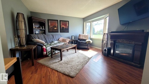 18 Westbend Street, Spruce Grove, AB - Indoor Photo Showing Living Room With Fireplace