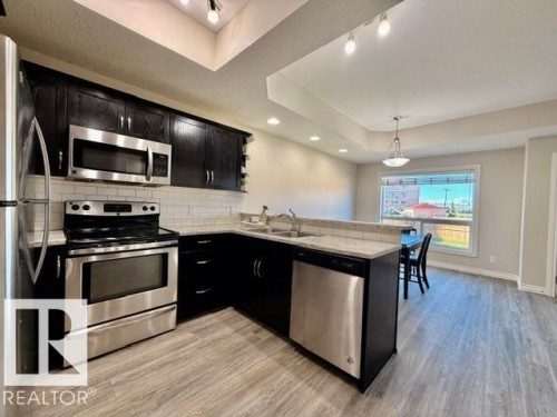 #8 4702 57 Av, Wetaskiwin, AB - Indoor Photo Showing Kitchen With Double Sink With Upgraded Kitchen