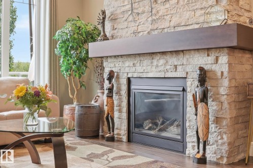 657 178A Street Sw, Edmonton, AB - Indoor Photo Showing Living Room With Fireplace