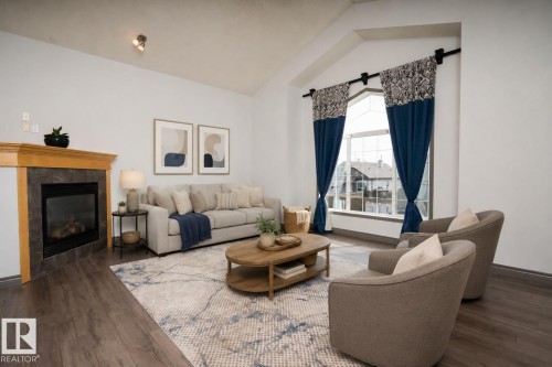 16820 57 Street Nw, Edmonton, AB - Indoor Photo Showing Living Room With Fireplace