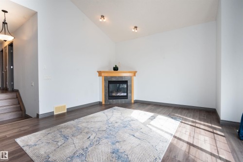 16820 57 Street Nw, Edmonton, AB - Indoor Photo Showing Living Room With Fireplace