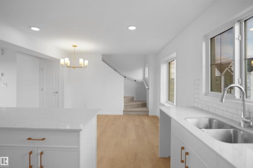 #71 17319 5 St Ne, Edmonton, AB - Indoor Photo Showing Kitchen With Double Sink