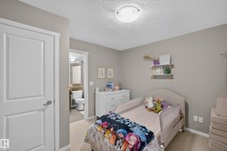Room with light gray walls and beige carpet - 