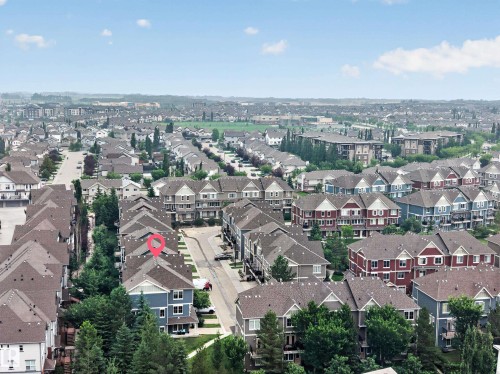Aerial perspective showcasing a residential community with varied architectural styles - #53 603 Watt Bv Sw, Edmonton, AB - Outdoor With View